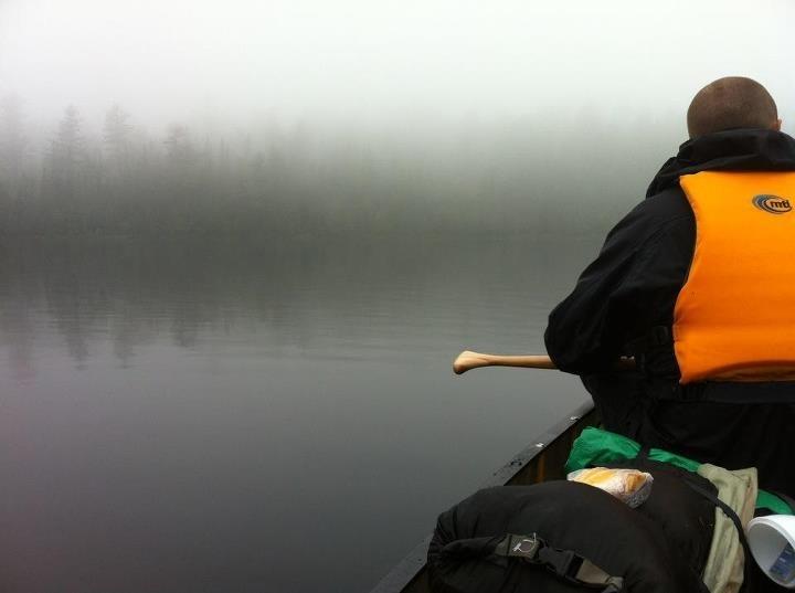 John Berini paddling into the BWCAW to collect moose browse samples.